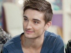 Tom Parker is wanted by the police