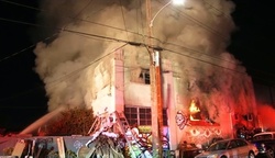 A fire in night club of Auckland claimed the lives of 33 people