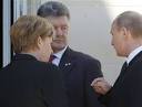Putin, Merkel and Hollande made a pause in the negotiations for the Protocol photo
