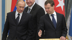 Obama says Medvedev-Putin tandem effective