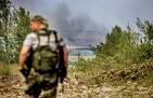 The Ukrainian Military says 40 attacks from militias
