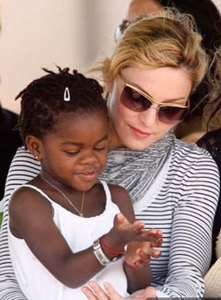 Madonna begged: `Show Mercy`